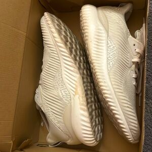 An Adidas sneaker a sports shoe very comfortable to walk in size 9